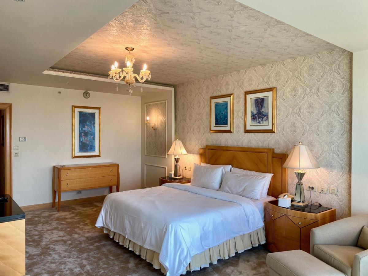 Chez Haytham At Four Seasons Nile Plaza Residential Suite Кайро Екстериор снимка